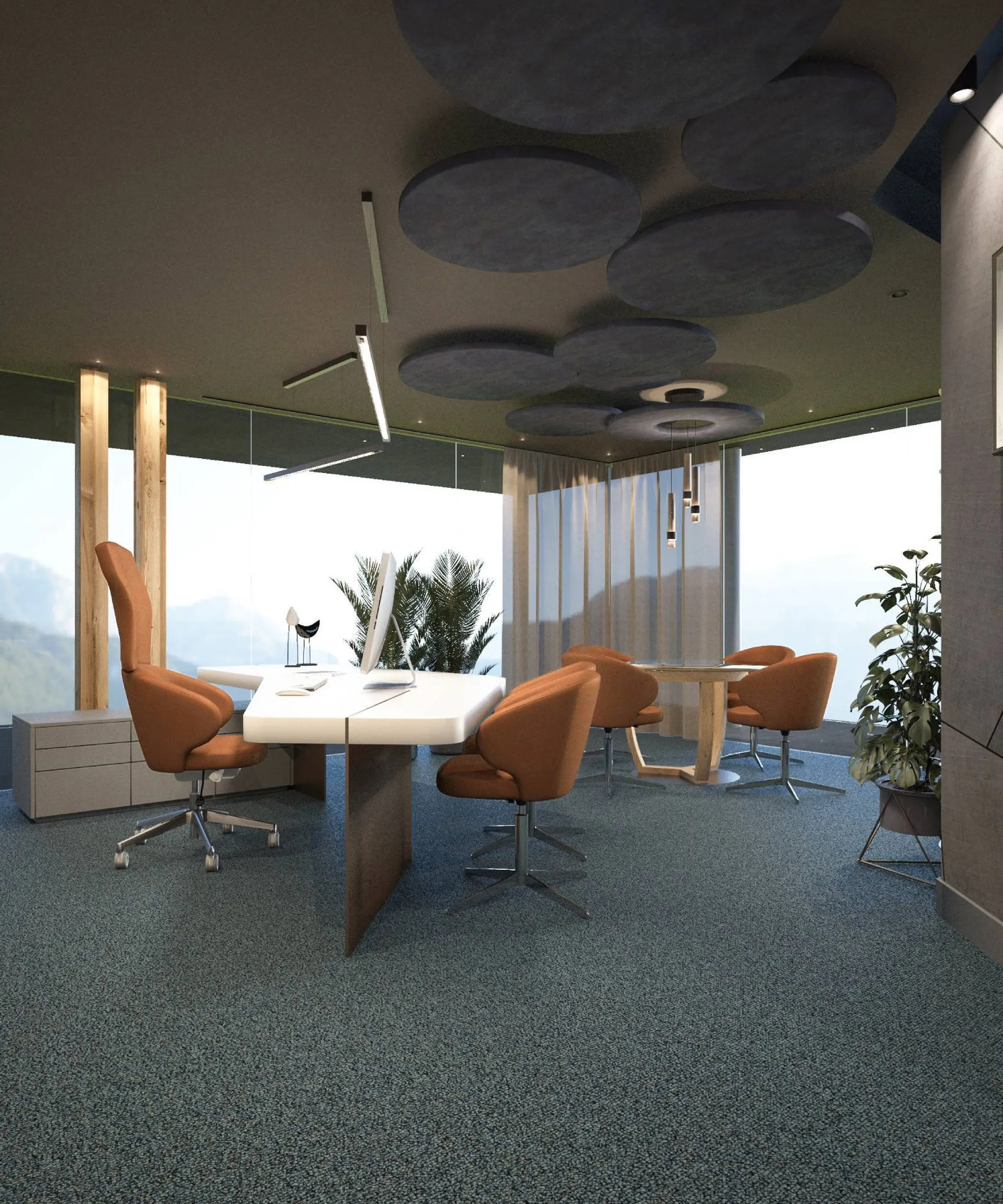 Ufficio moderno con grandi finestre e vista sulle montagne, soffitto con pannelli acustici circolari, tavolo bianco al centro e sedie arancioni, piante e moquette blu.