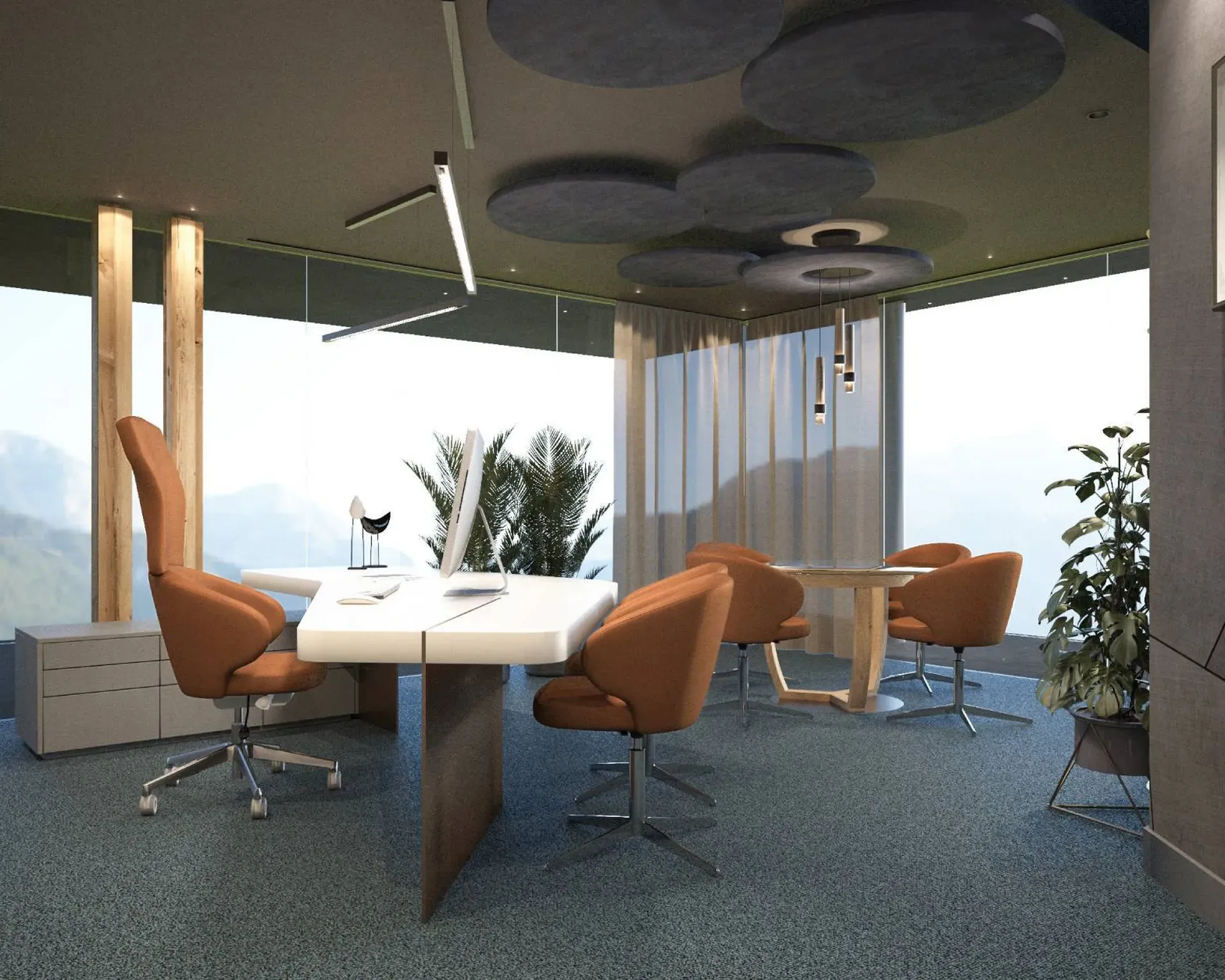 Ufficio moderno con grandi finestre e vista sulle montagne, soffitto con pannelli acustici circolari, tavolo bianco al centro e sedie arancioni, piante e moquette blu.