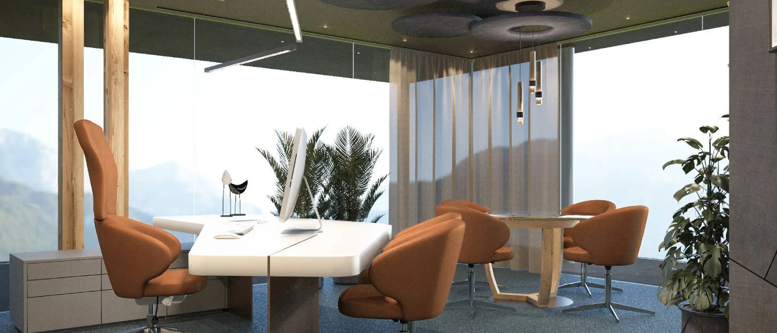 Ufficio moderno con grandi finestre e vista sulle montagne, soffitto con pannelli acustici circolari, tavolo bianco al centro e sedie arancioni, piante e moquette blu.